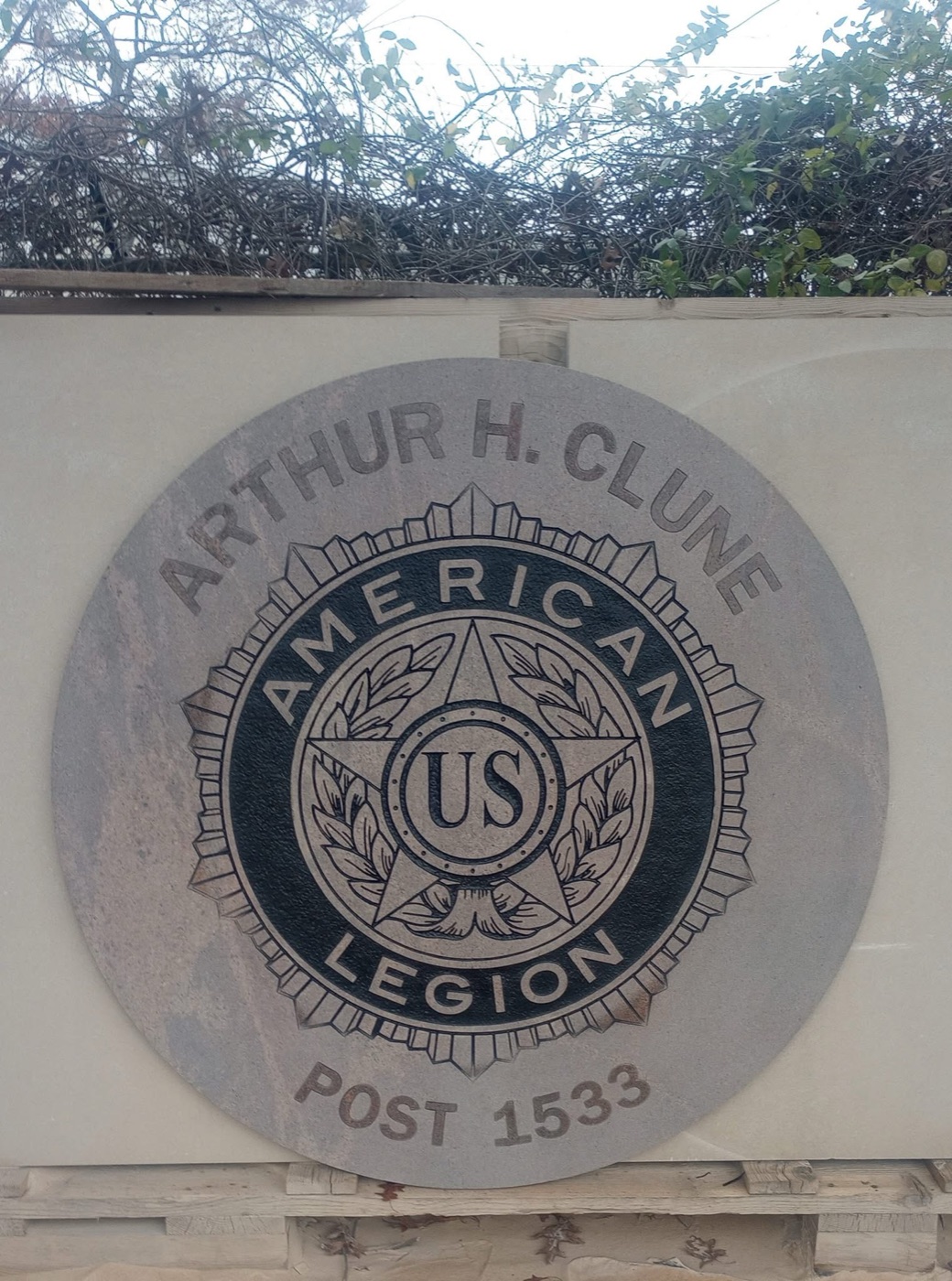 Engraved granite medallion for Arthur H. Clune American Legion Post 1533