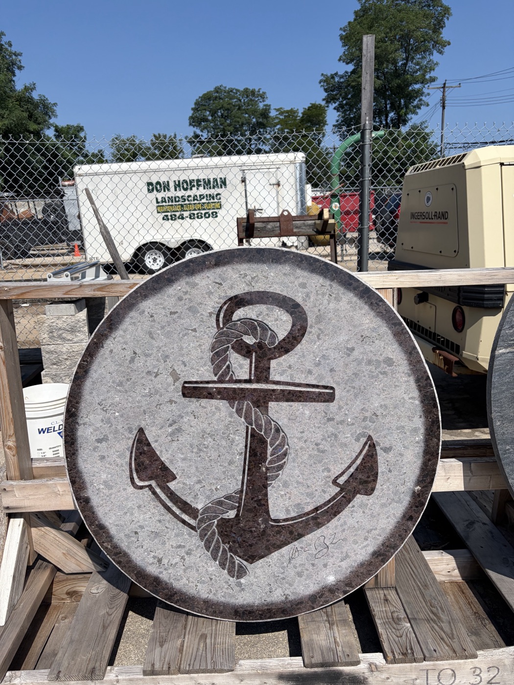 Brown and red anchor with rope on grey speckled granite, in-stock inlay design