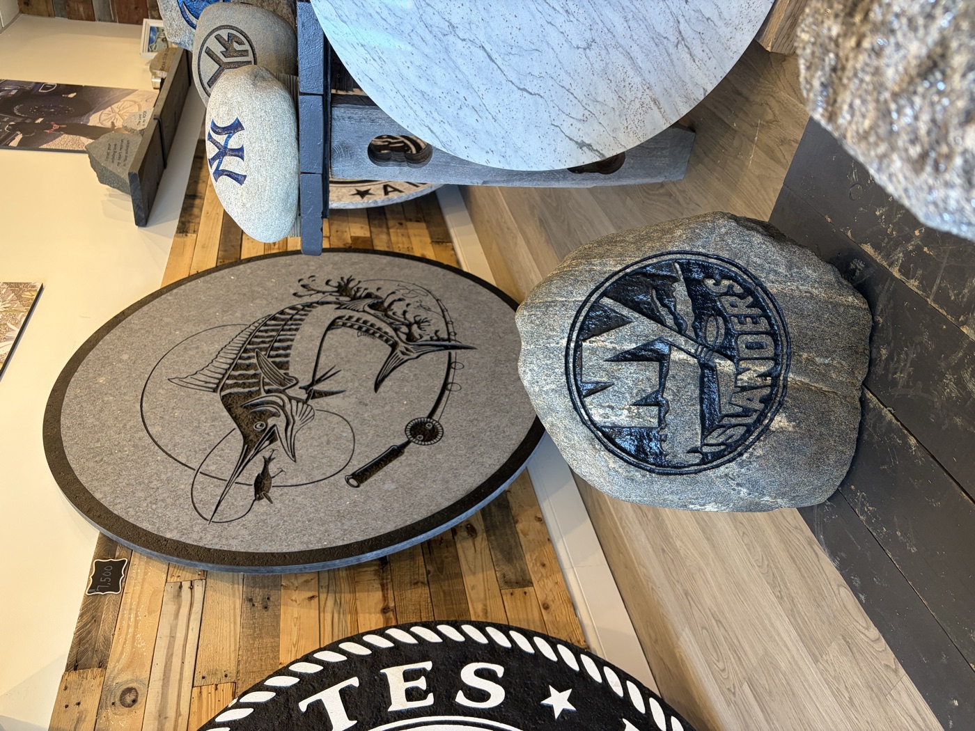 New York Islanders engraved rock beside a marlin stone medallion in the showroom