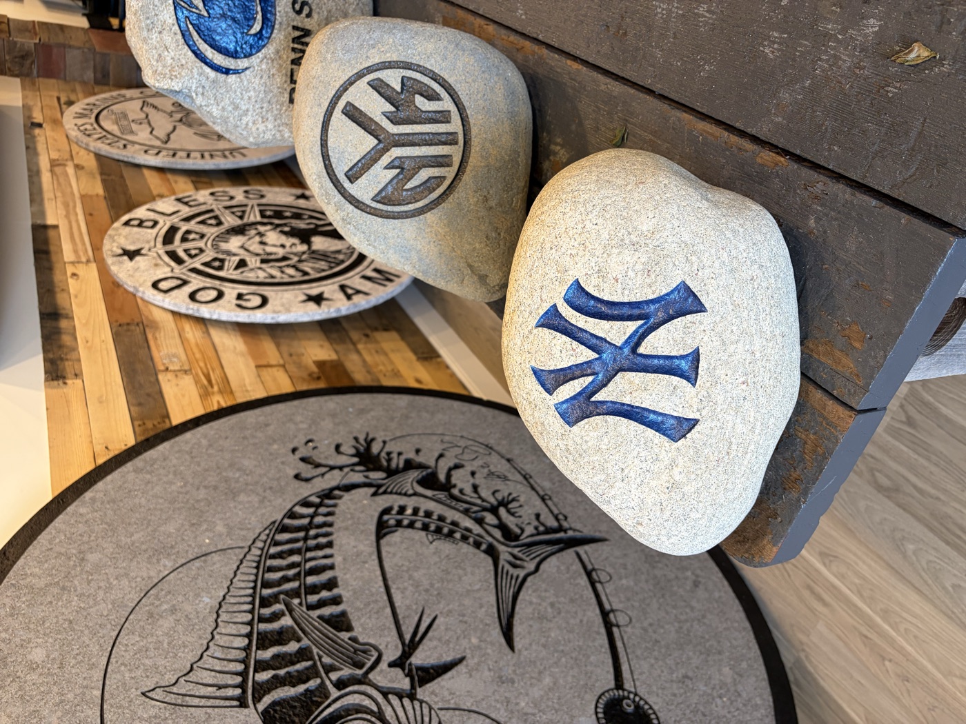 New York Yankees interlocking NY logo engraved rock in blue